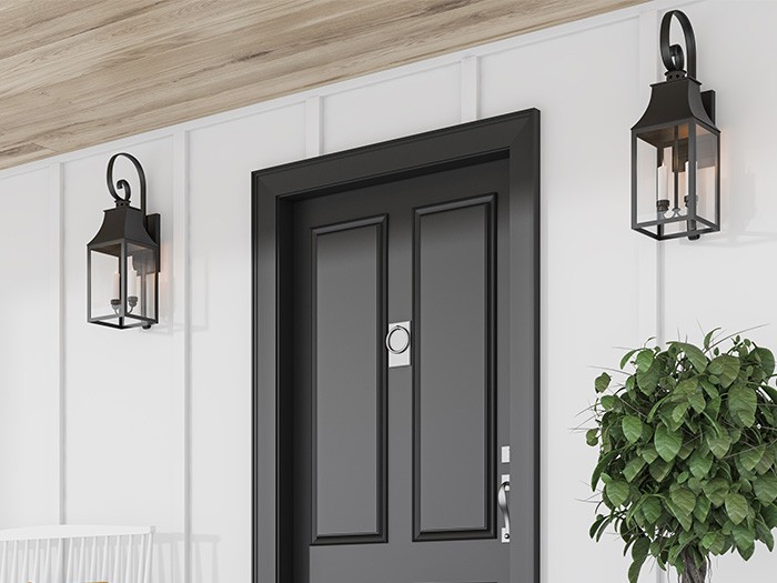 White wooden siding with black door and elegant black light fixtures